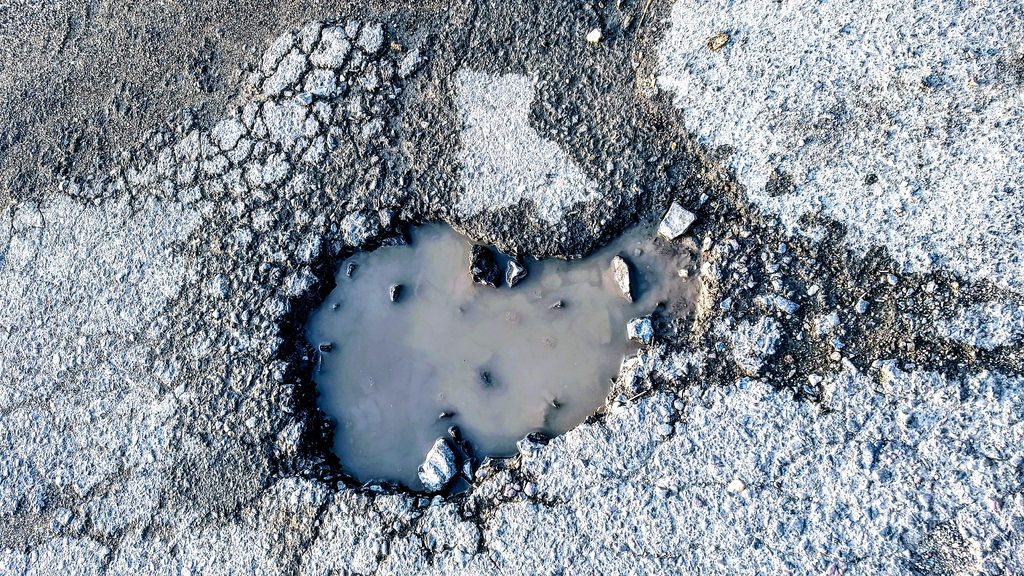 Pothole in concrete bridge