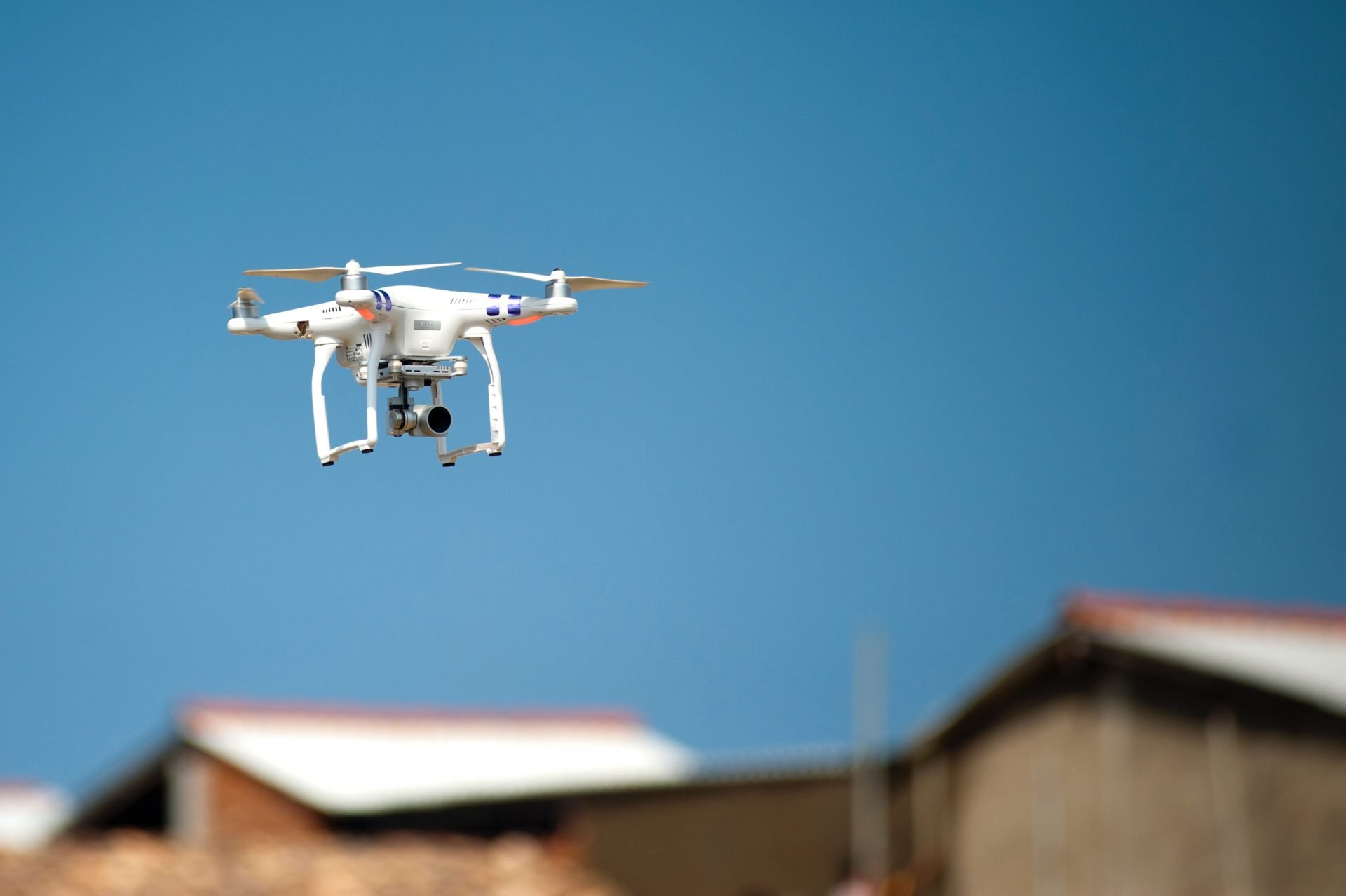 UAV Flying over Building - Drone Inspections