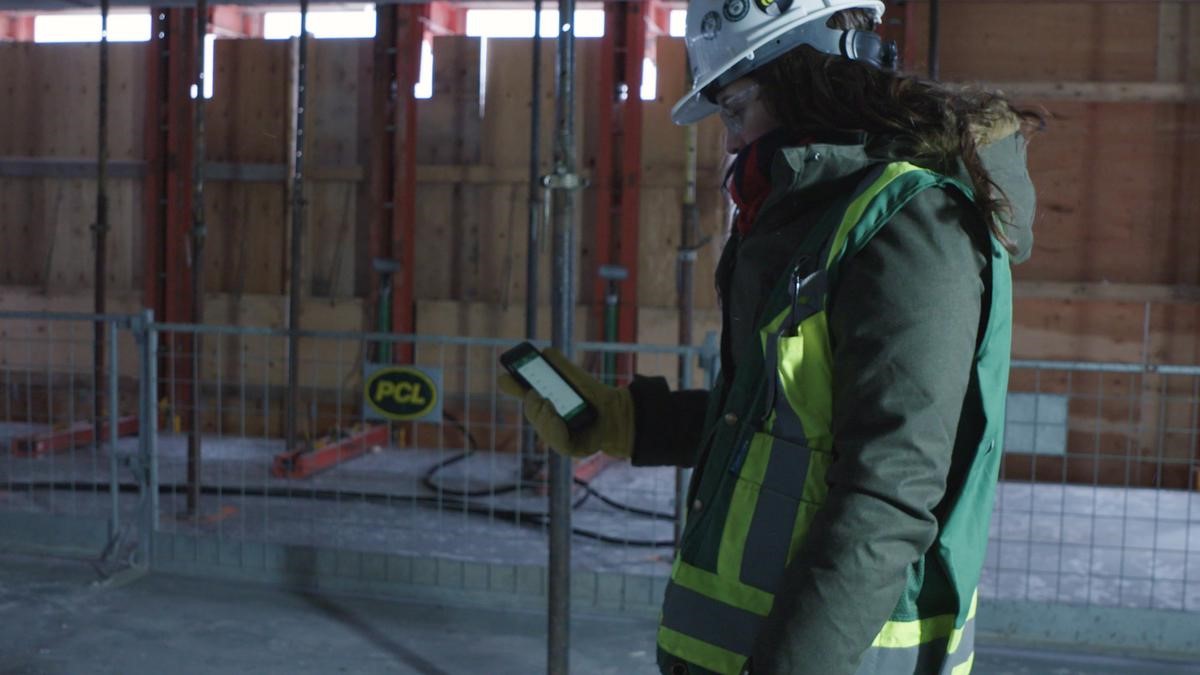 Contractor Checks Concrete Strength on Smartphone