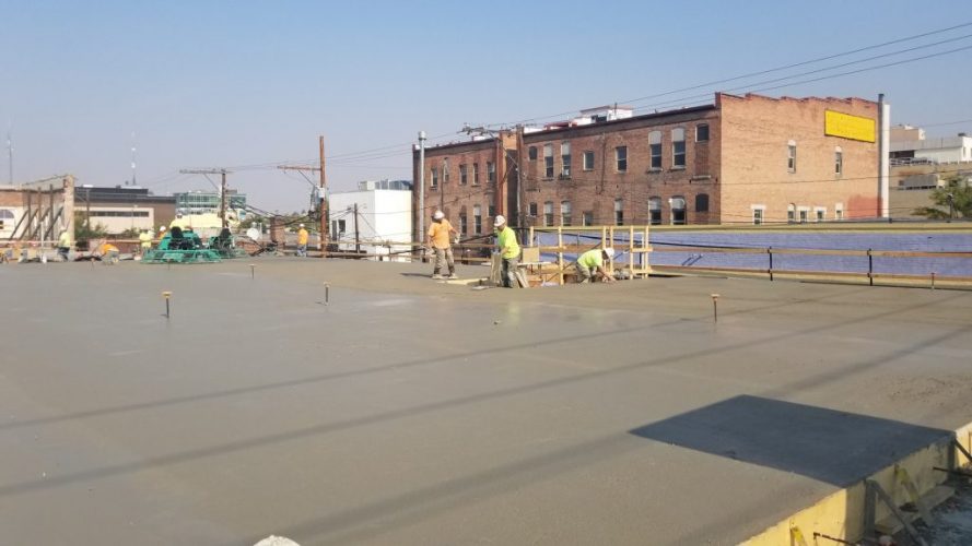 Poured concrete curing at jobsite