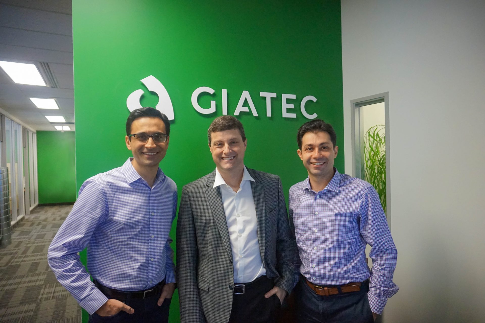 New CEO Paul Loucks, with Giatec co-founders Aali and Pouria