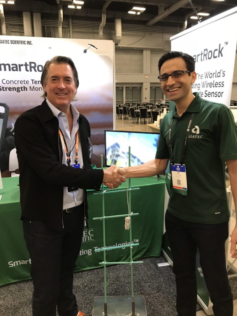 Shaking hands with Procore CEO