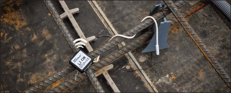 A SmartRock® sensor attached to rebar