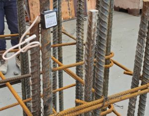SmartRock 2 installed on rebar before a pour