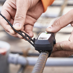 smartrock sensor being attached to rebar