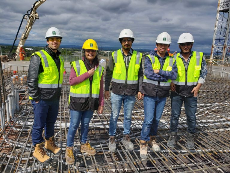 Giatec employees at a construction site