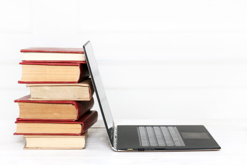 Computer with books