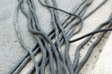 abstract-cables-on-concrete-surface-in-daylight-2026-01-09-14-43-25-utc-scaled.jpg
